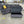 Dark Gray Cuddler Sectional w/Storage Ottoman