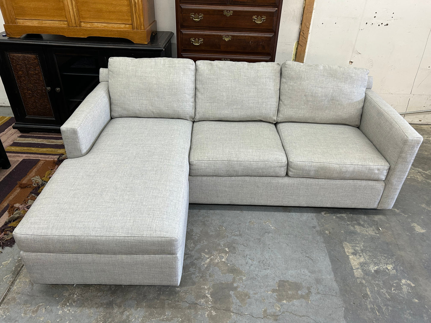 Gray Crate & Barrel Reversible Chaise Sectional And Storage Ottoman