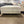 Off-White Upholstered Ottoman