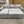 Reversible Sofa Chaise with Storage and pullout.