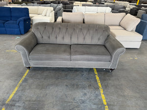 Gray Tufted Sofa with Nailhead Trim