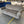 Gray Tufted Sofa with Nailhead Trim