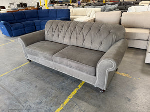 Gray Tufted Sofa with Nailhead Trim