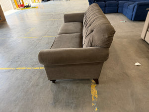 Gray Tufted Sofa with Nailhead Trim