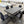 Modern Gray Dining Table Set with 6 Black Leather Chairs & Chrome Legs