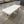 Modern White Bouclé Bench with Gold Geometric Legs