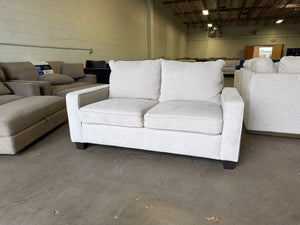 Living Spaces Beige Loveseat