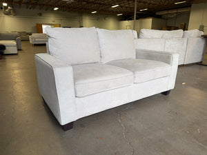Living Spaces Beige Loveseat
