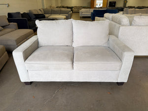 Living Spaces Beige Loveseat