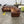 Brown Leather L-Shaped Sectional with Rolled Arms & Nailhead Trim