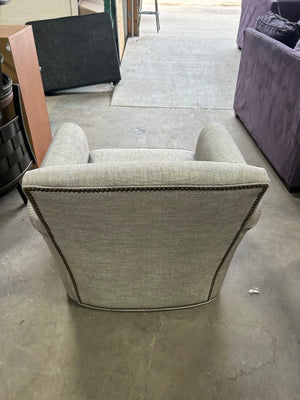 Studded Gray Swivel Chair